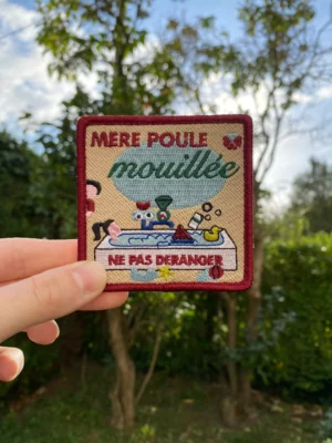 Écussons - Mère poule mouillée