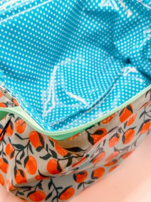Trousse ouverture géante - Bleue à oranges